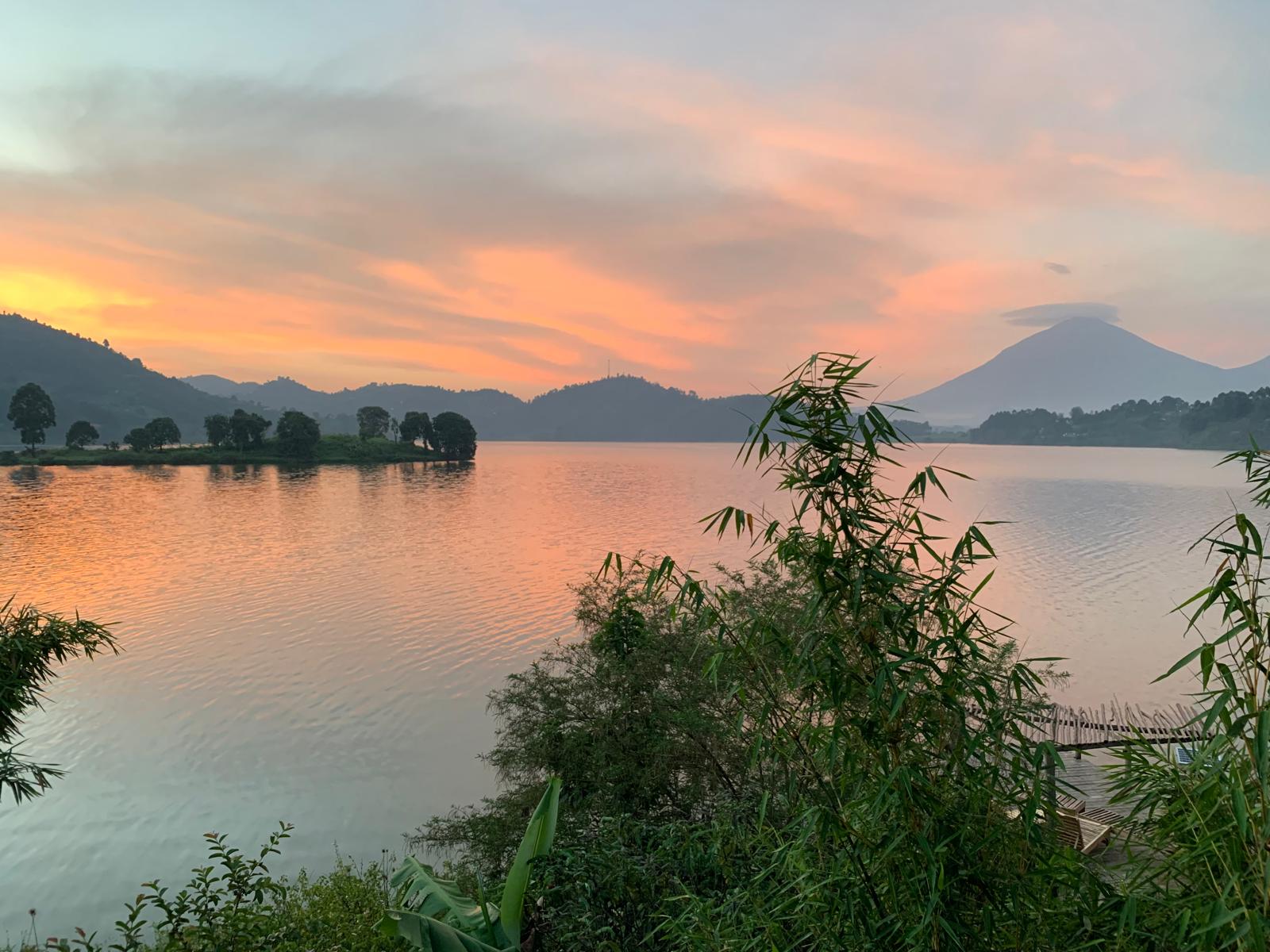 Sunset over Lake Mulehe with the Virunga volcanoes in the distance