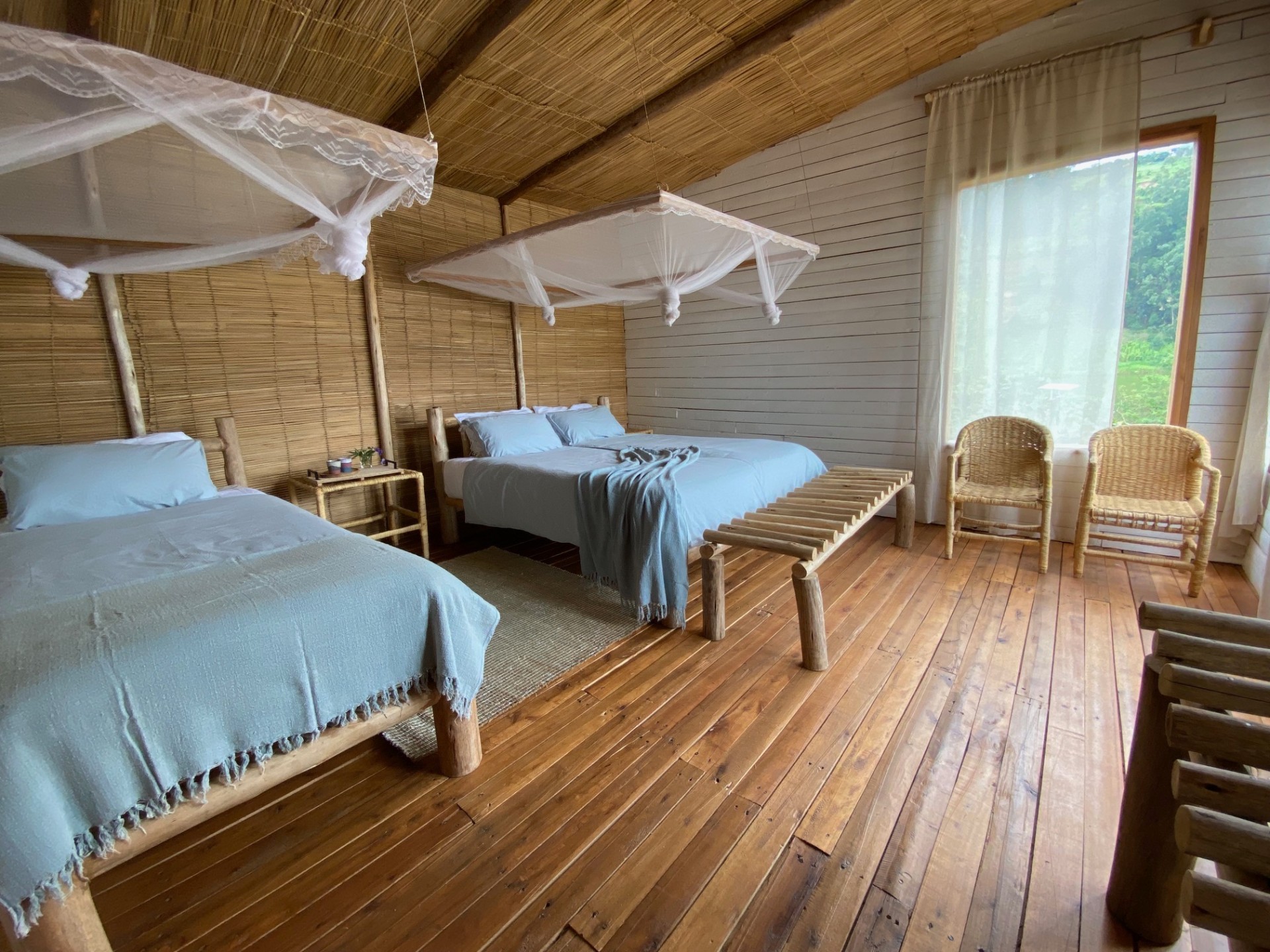 Lake Cabin · twin beds with canopies
